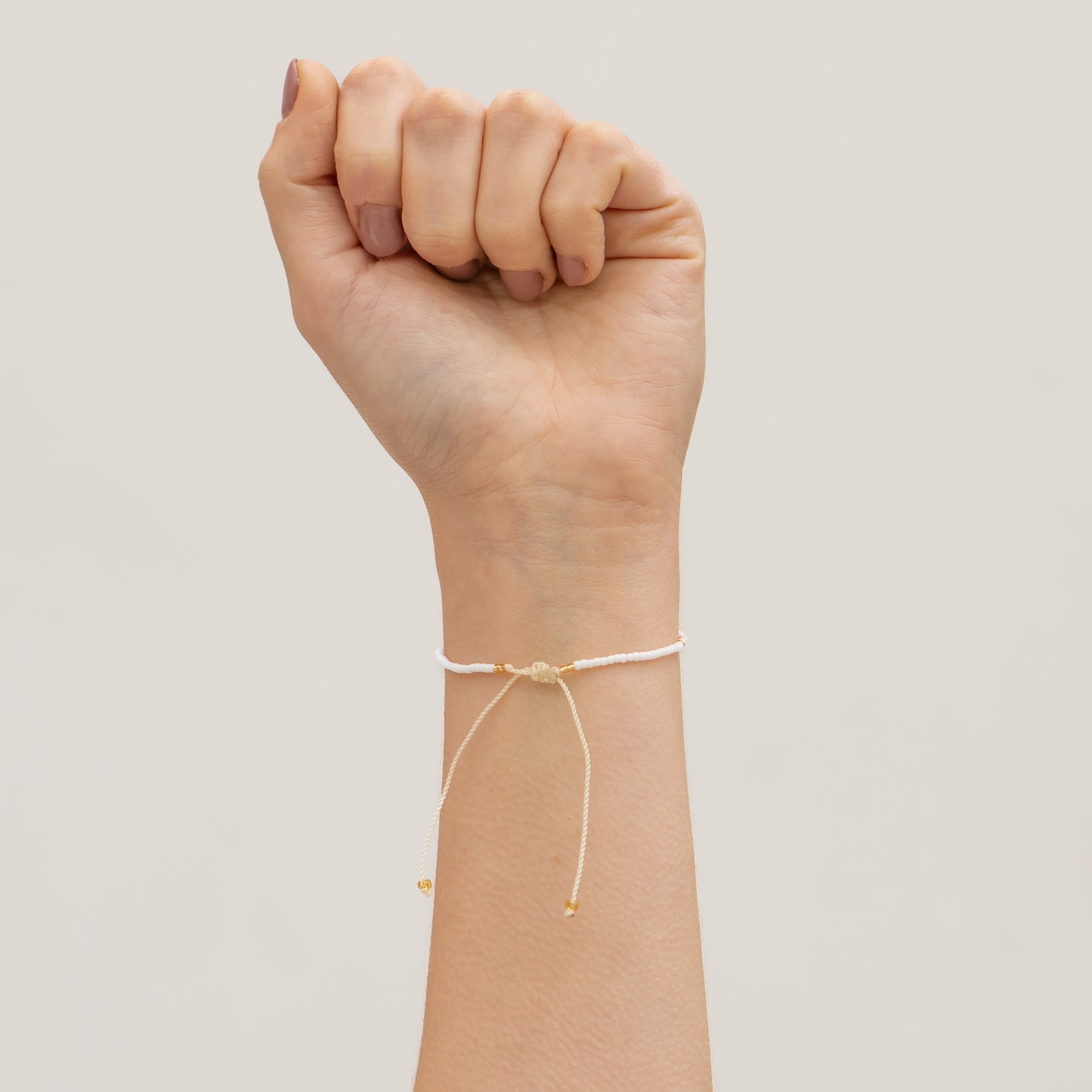 White and Gold Beaded String Bracelet