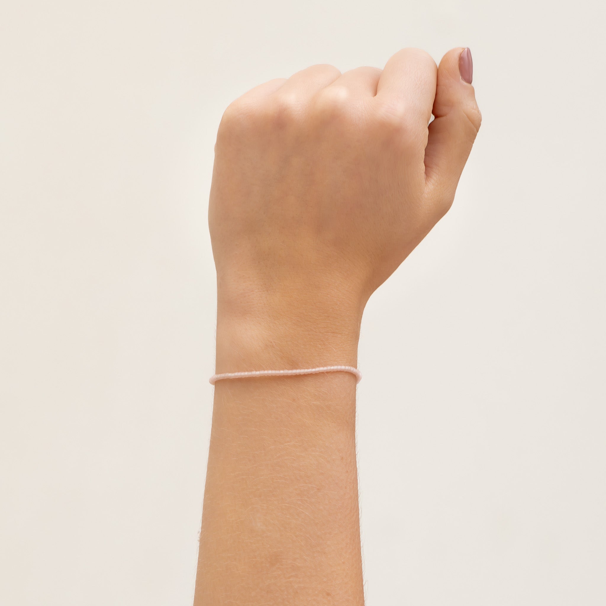 Light Pink Beaded String Bracelet